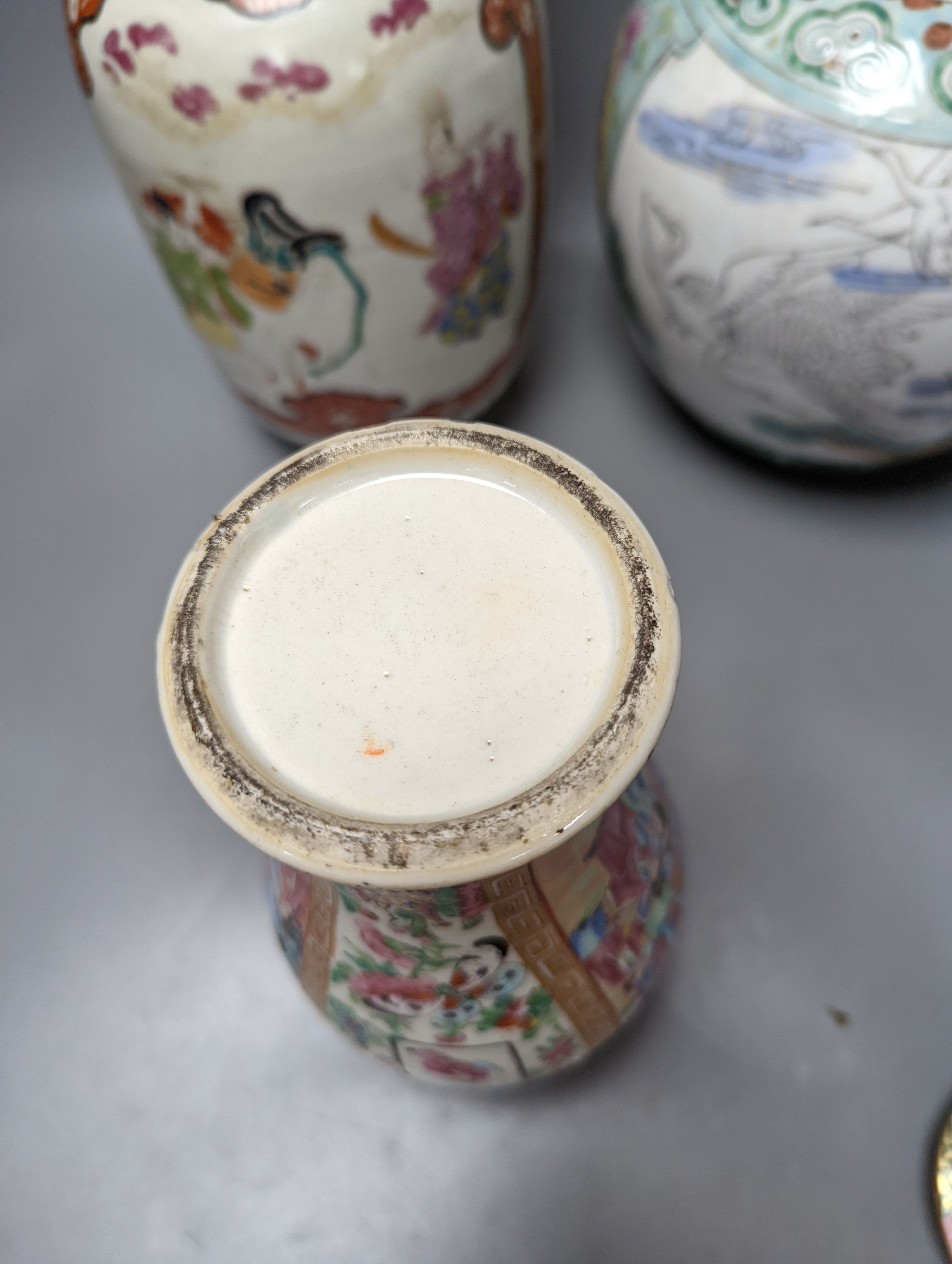 A Chinese famille rose vase and two ginger jars, together with a Japanese vase, 38cm